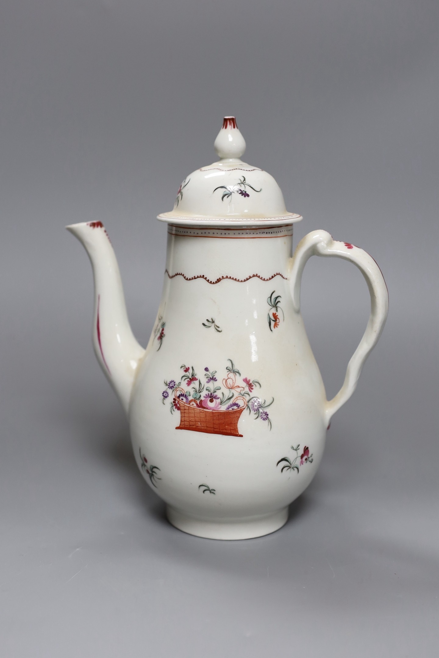 A Chinese export famille rose coffee pot and cover, circa 1800, 25 cms high